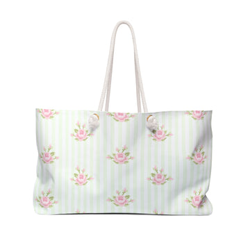 White tote bag with pink floral pattern on a white background