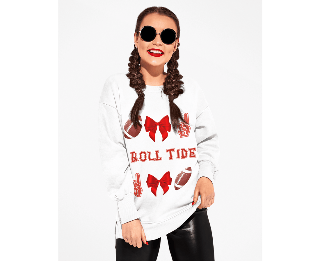 Woman wearing a white sweatshirt with red graphics on a white background