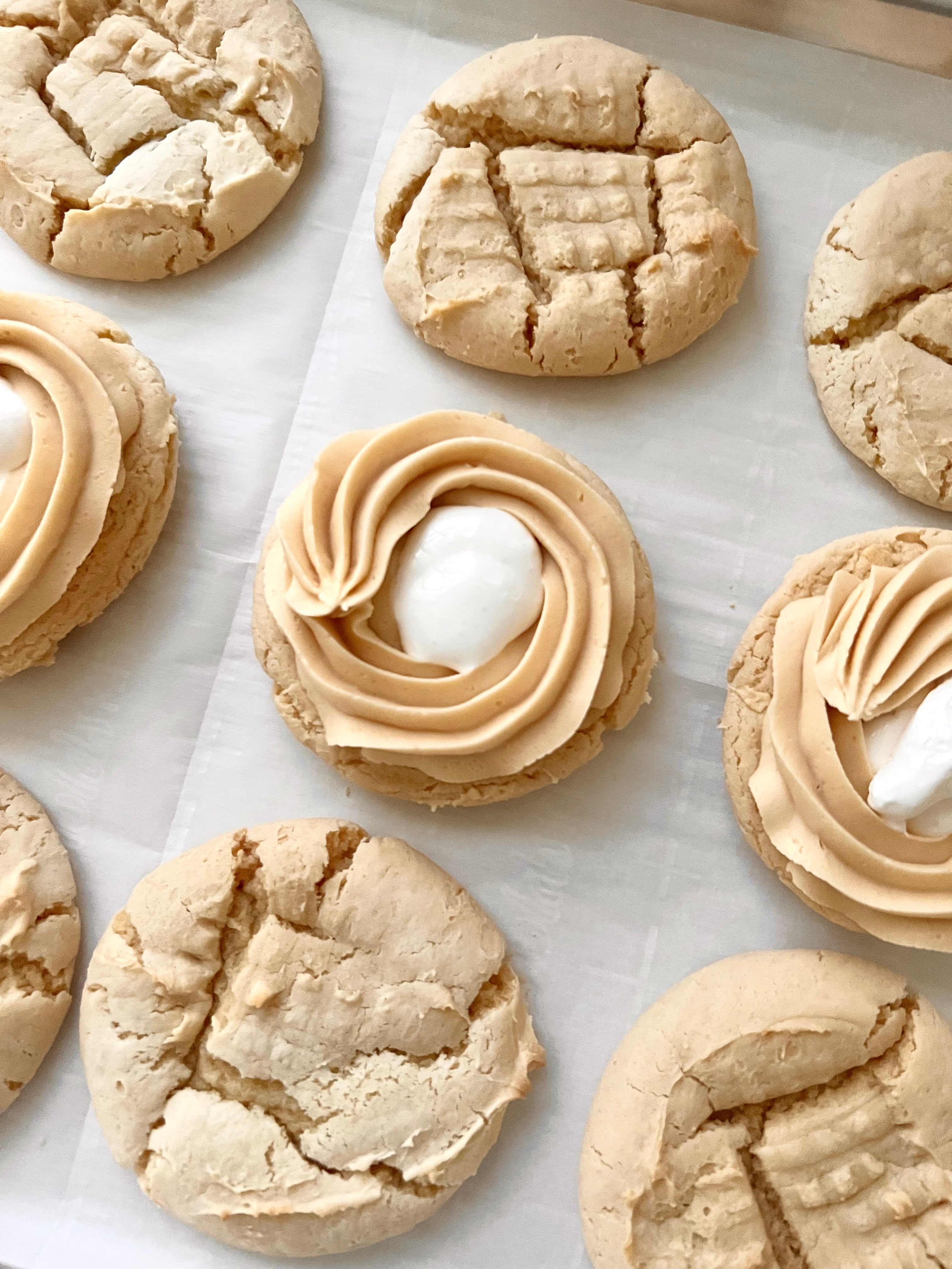 Cookies with a cream filling on a marble surface