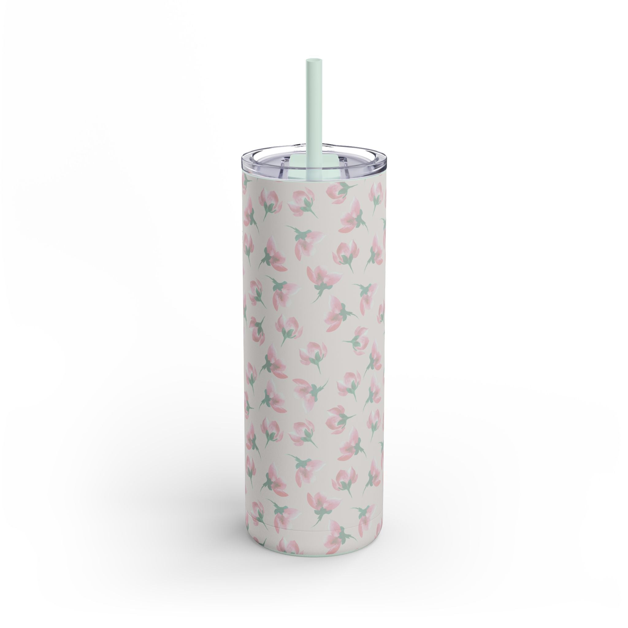 Tumbler with floral pattern and straw on a white background