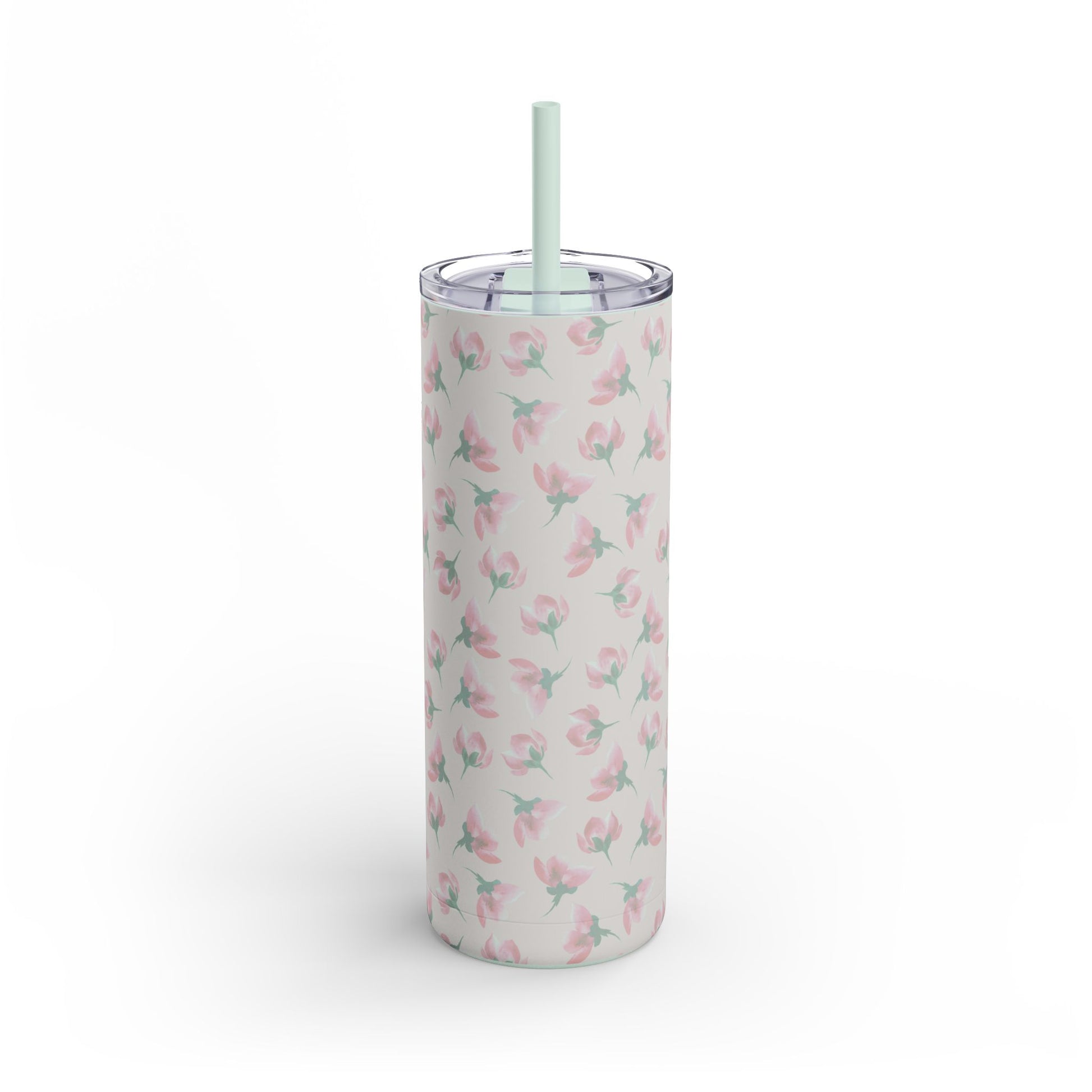Tumbler with floral pattern and straw on a white background