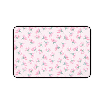 Floral patterned mat with pink flowers on a white background