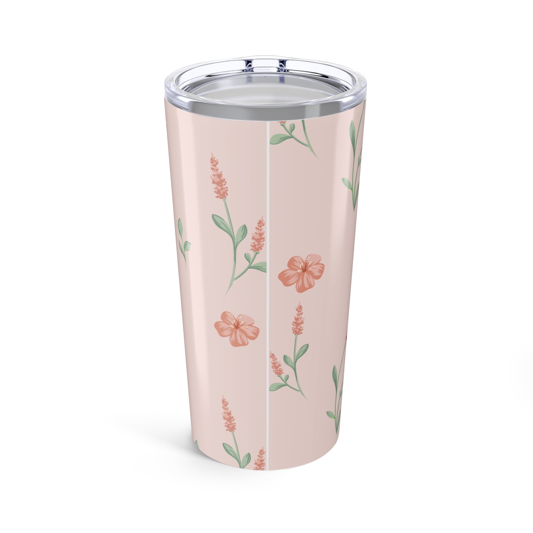 Floral-patterned tumbler on a pink background