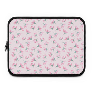Laptop sleeve with pink floral pattern on a white background