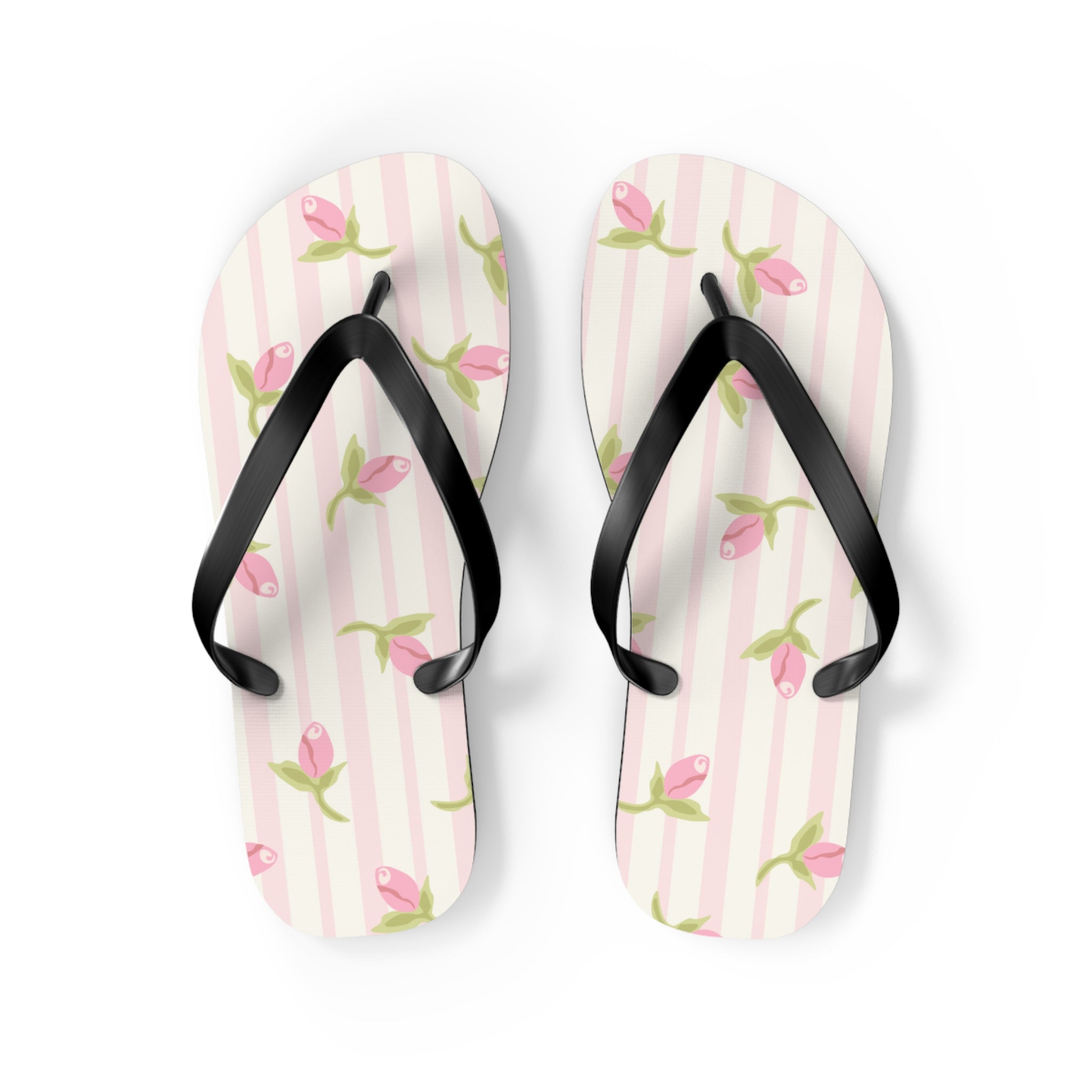 Pair of flip-flops with floral pattern on a white background