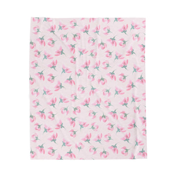Floral patterned fabric with pink flowers on a light pink background