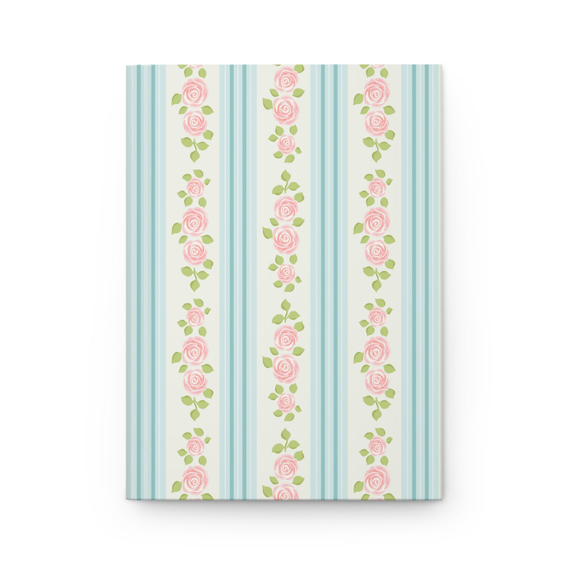 Notebook with pink floral pattern on a striped blue and white background
