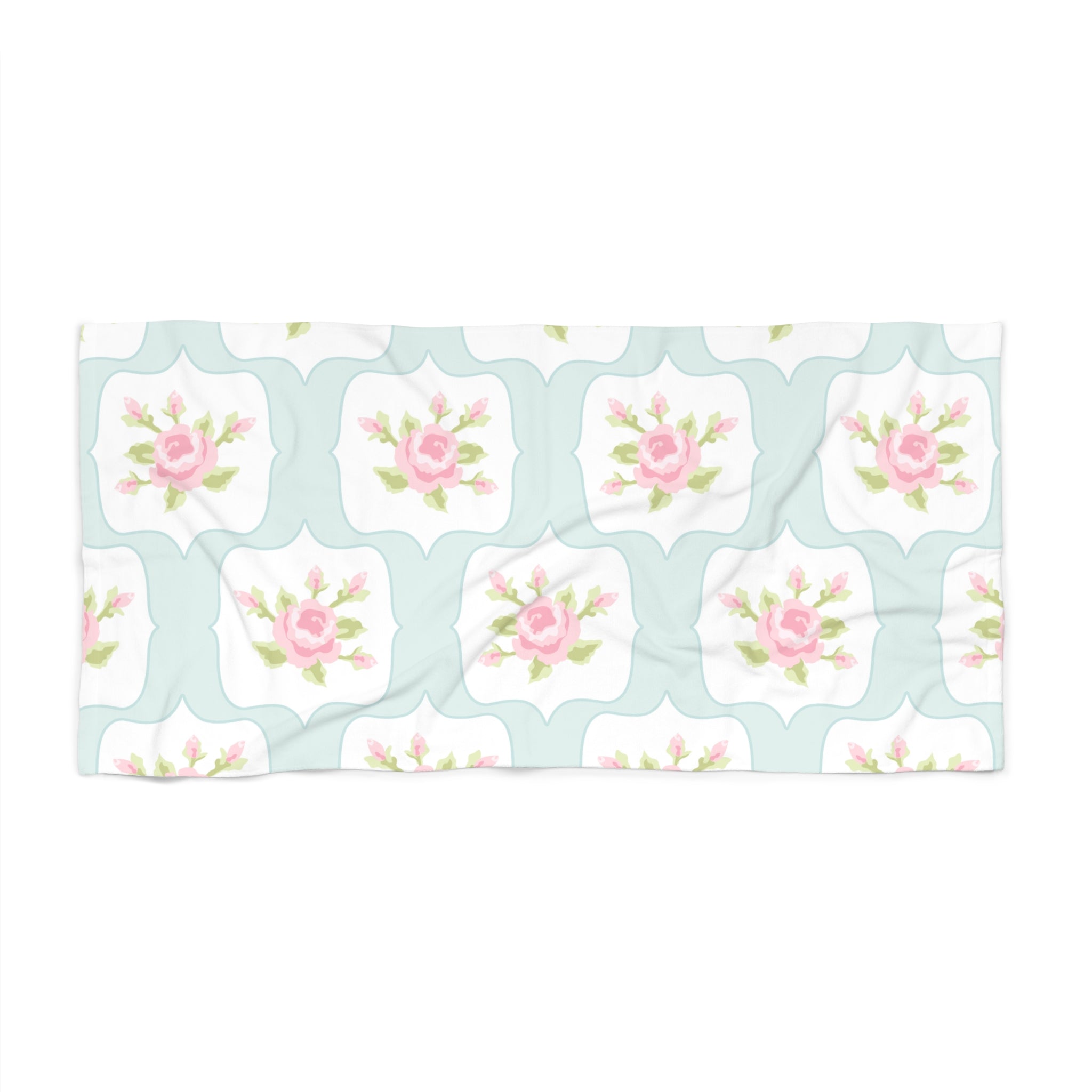 Floral patterned fabric with pink roses on a light blue background