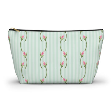 Cosmetic bag with floral pattern on a light green striped background