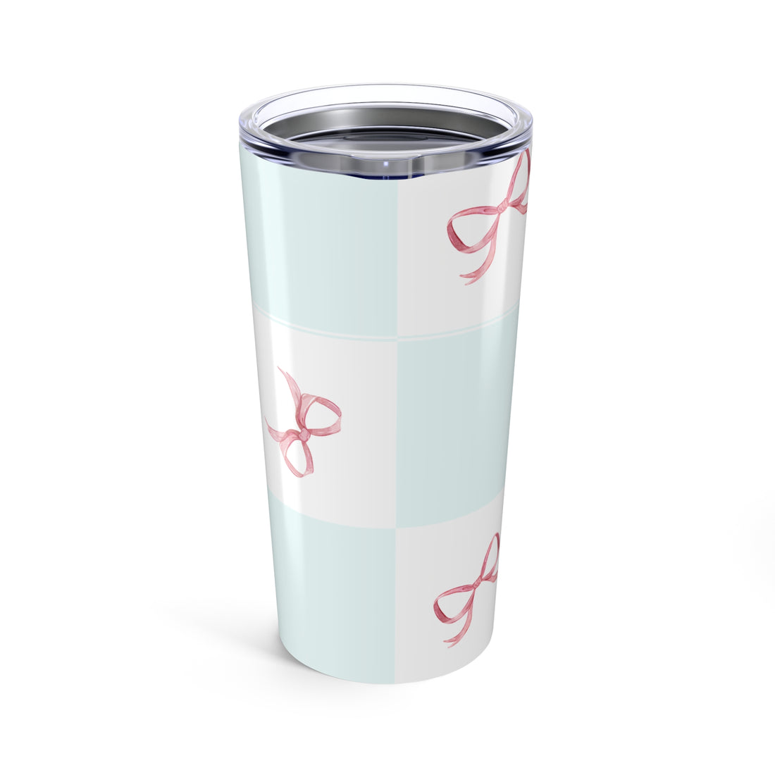 Tumbler with pink bow design on a white background