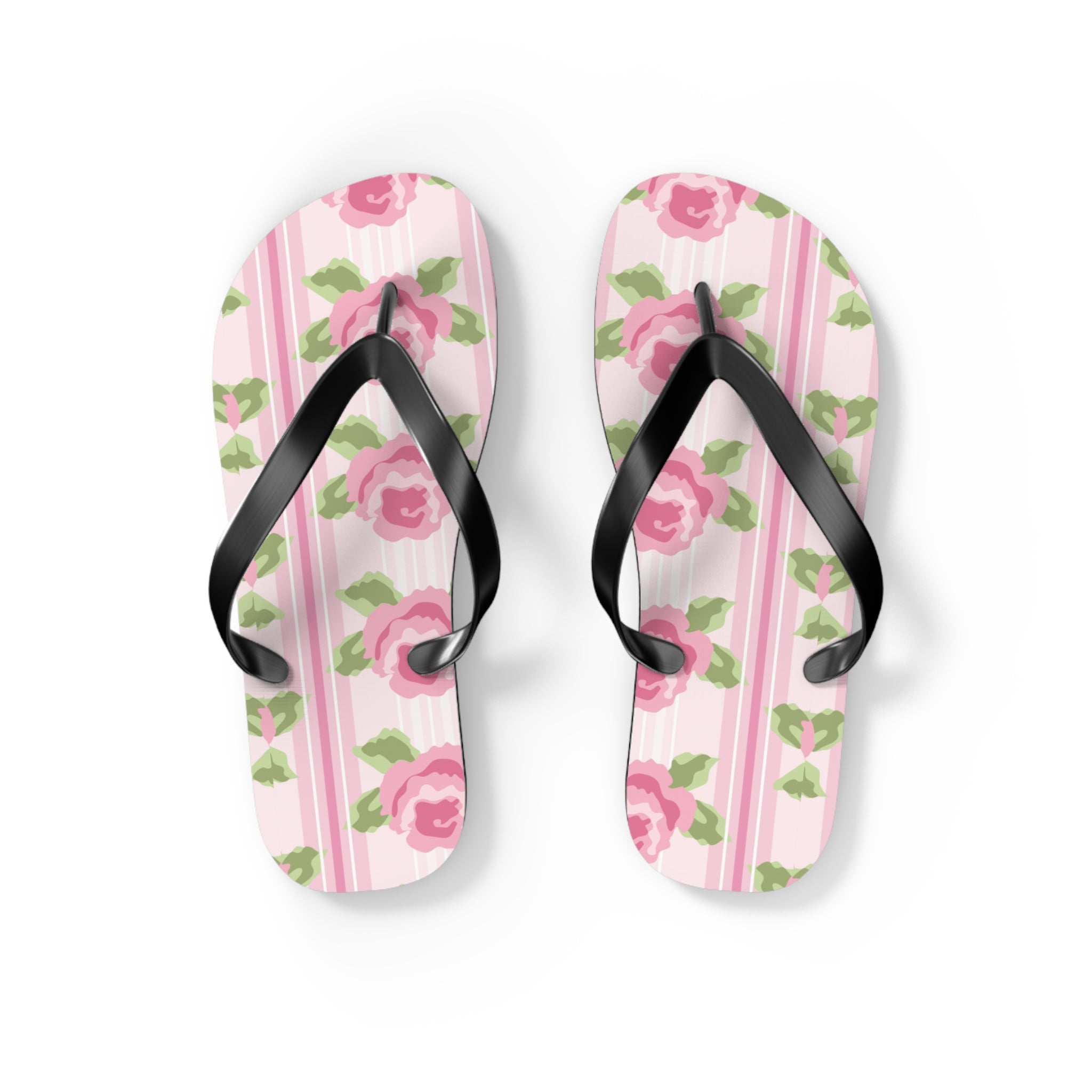 Pair of flip-flops with floral pattern on a light pink background
