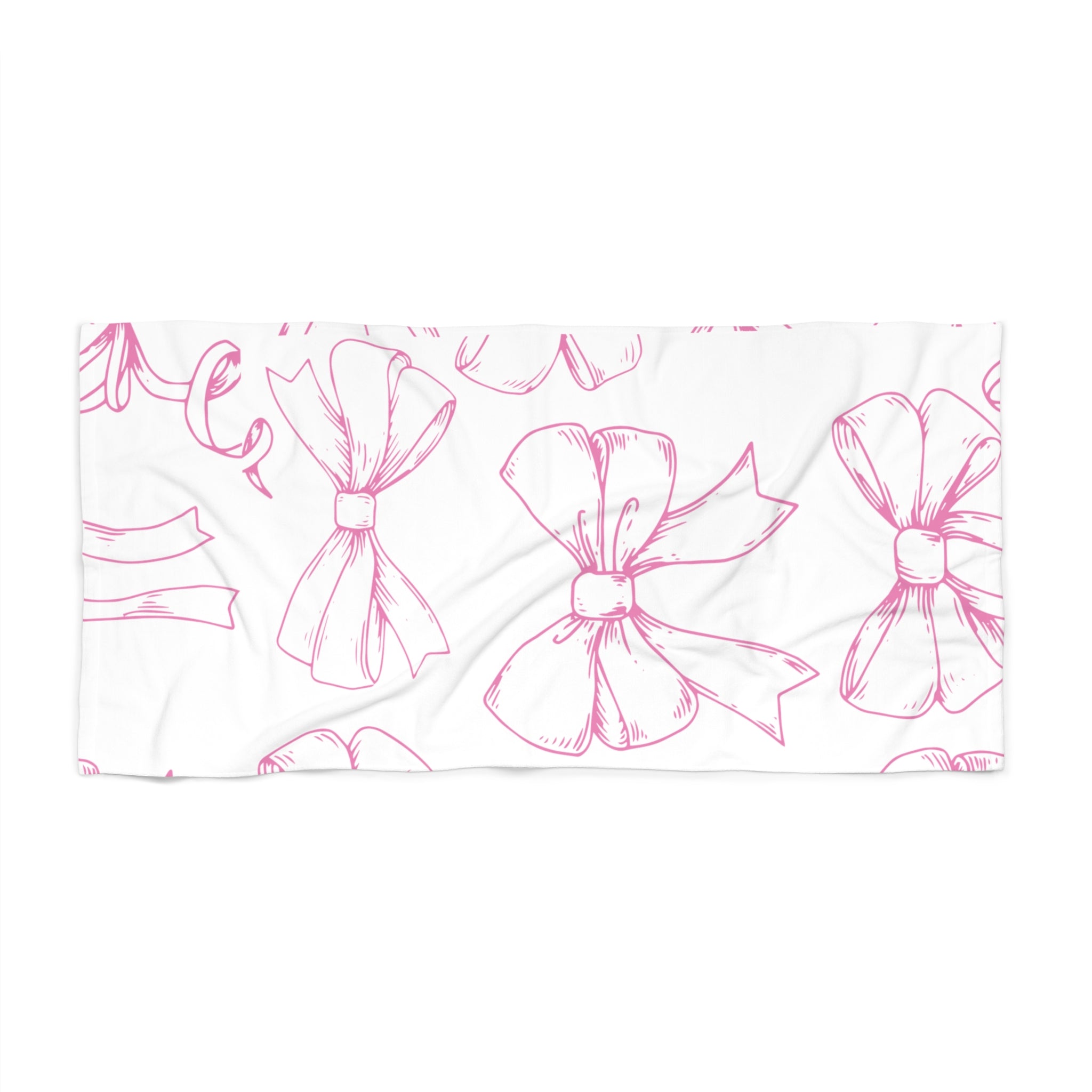 White towel with pink bow pattern on a white background