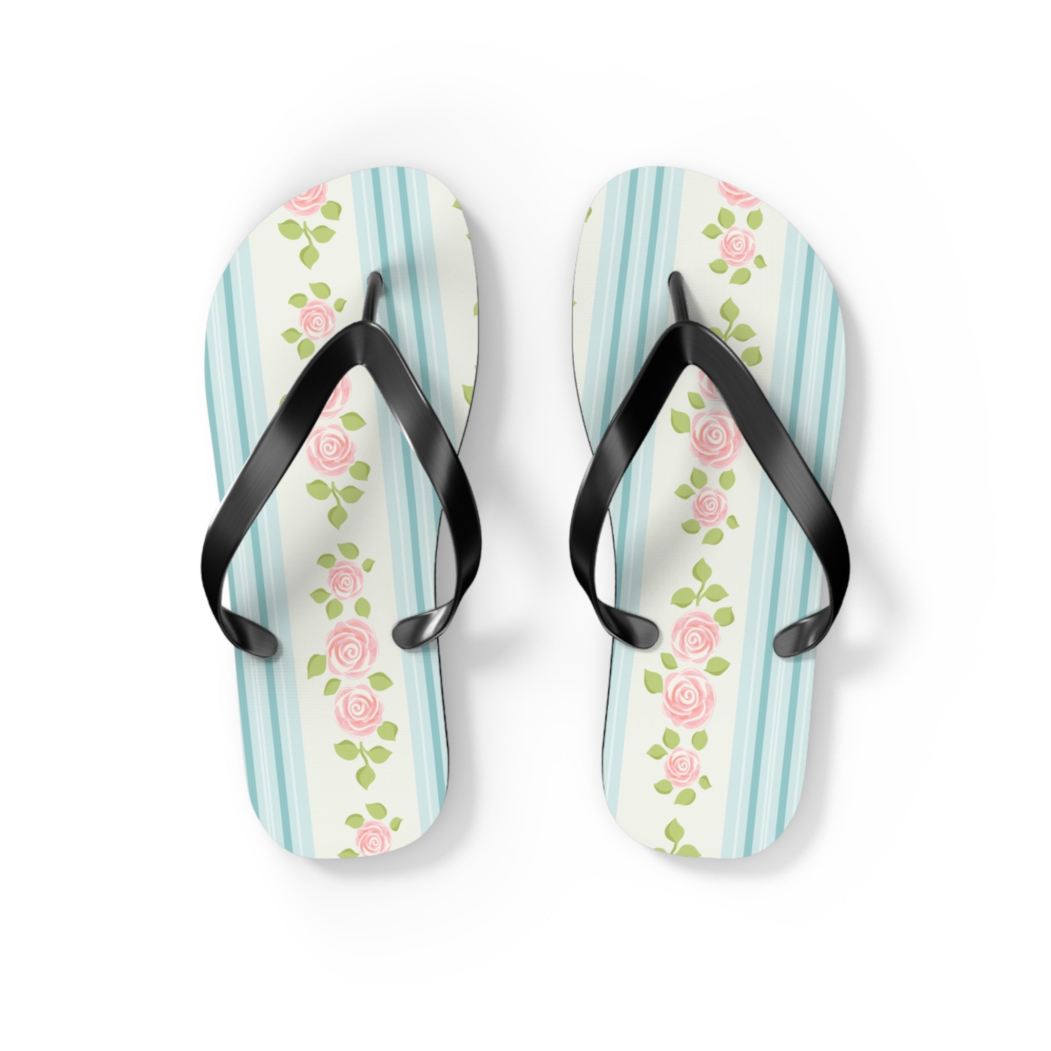 Pair of flip-flops with floral design on a white background