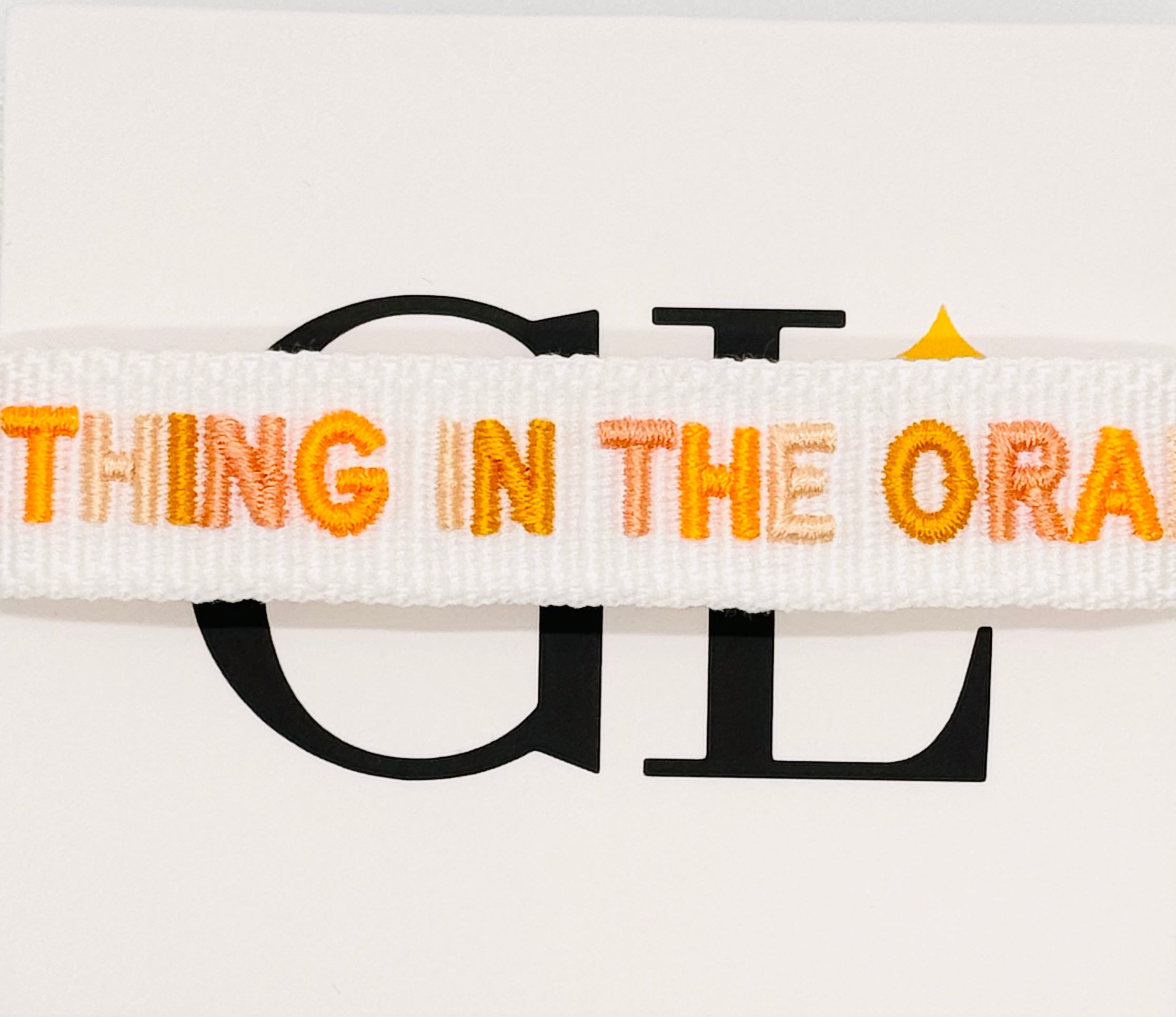 Something In The Orange Team Tassel Bracelet