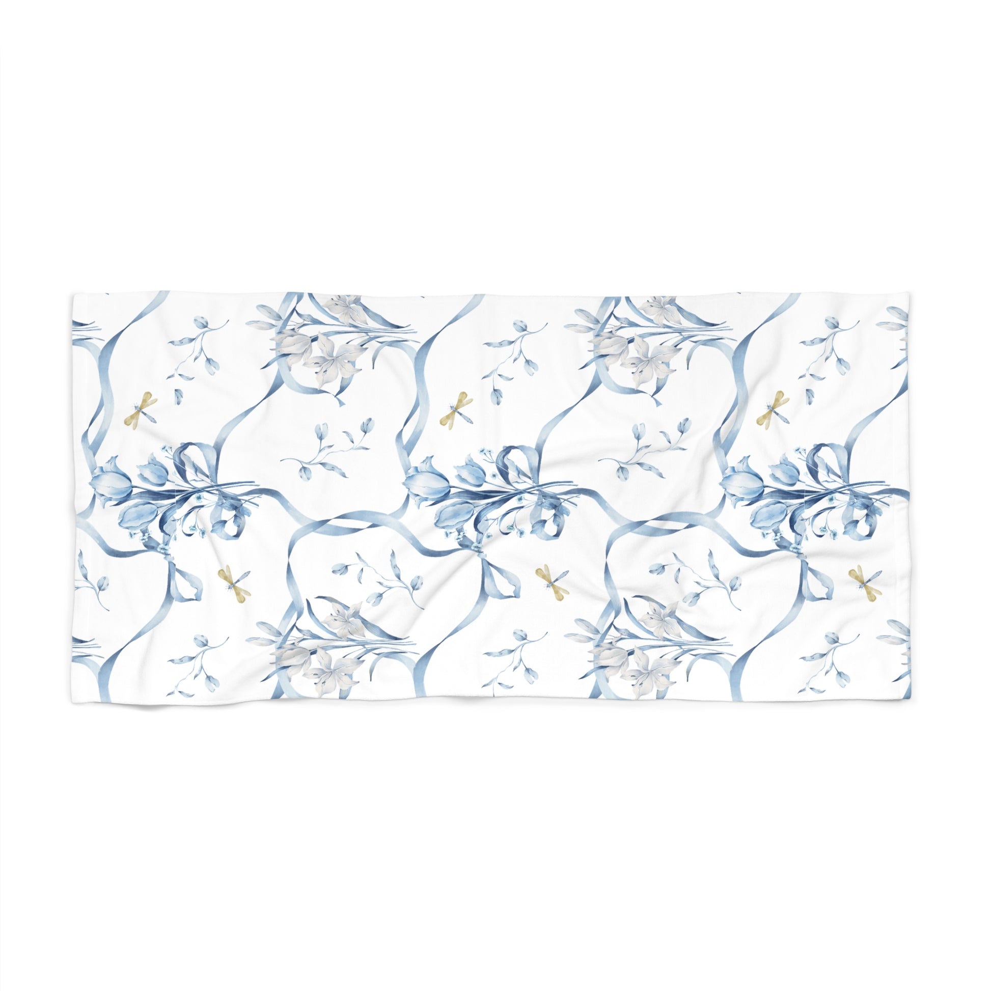 Floral patterned towel with blue and white design on a white background