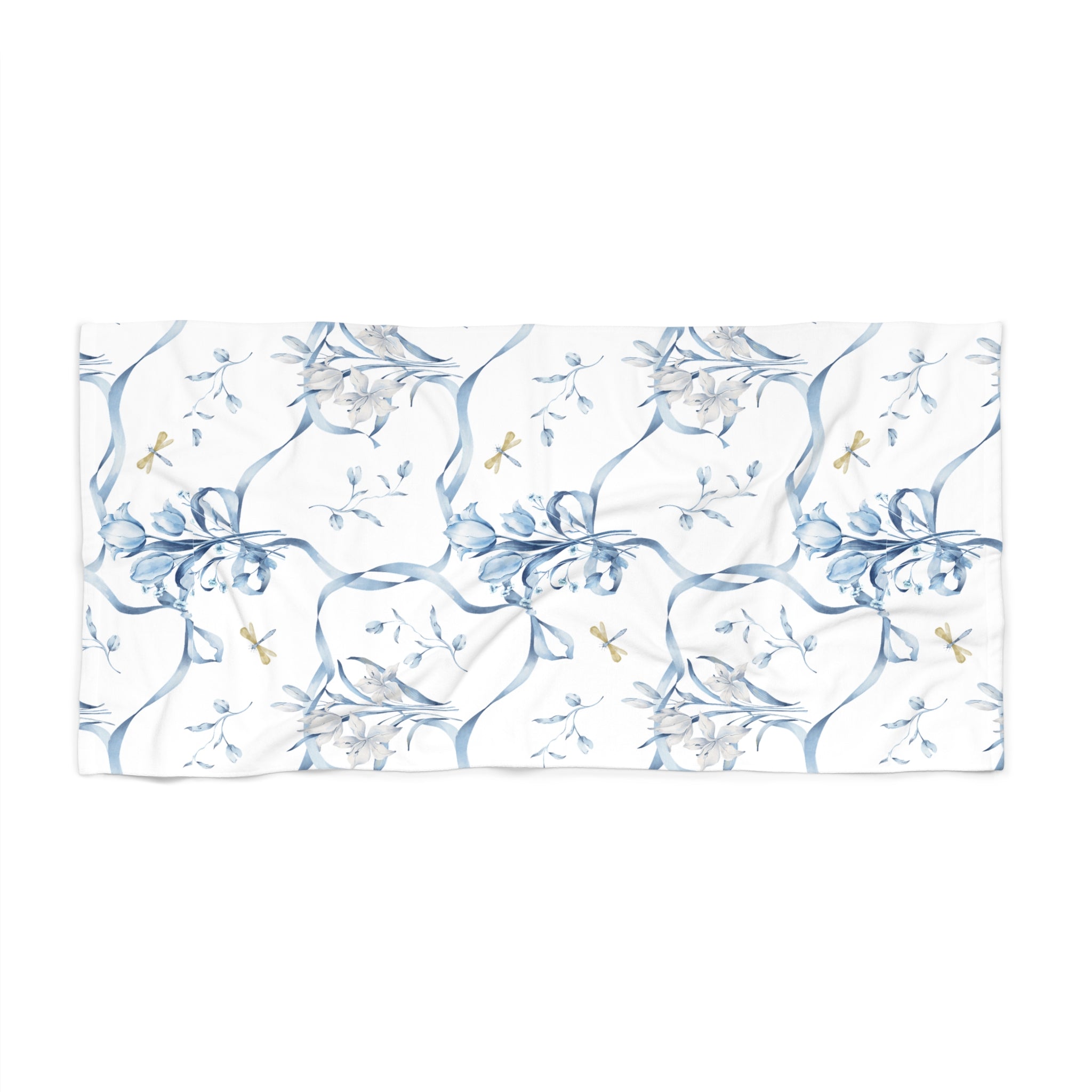 Floral patterned towel with blue and white design on a white background