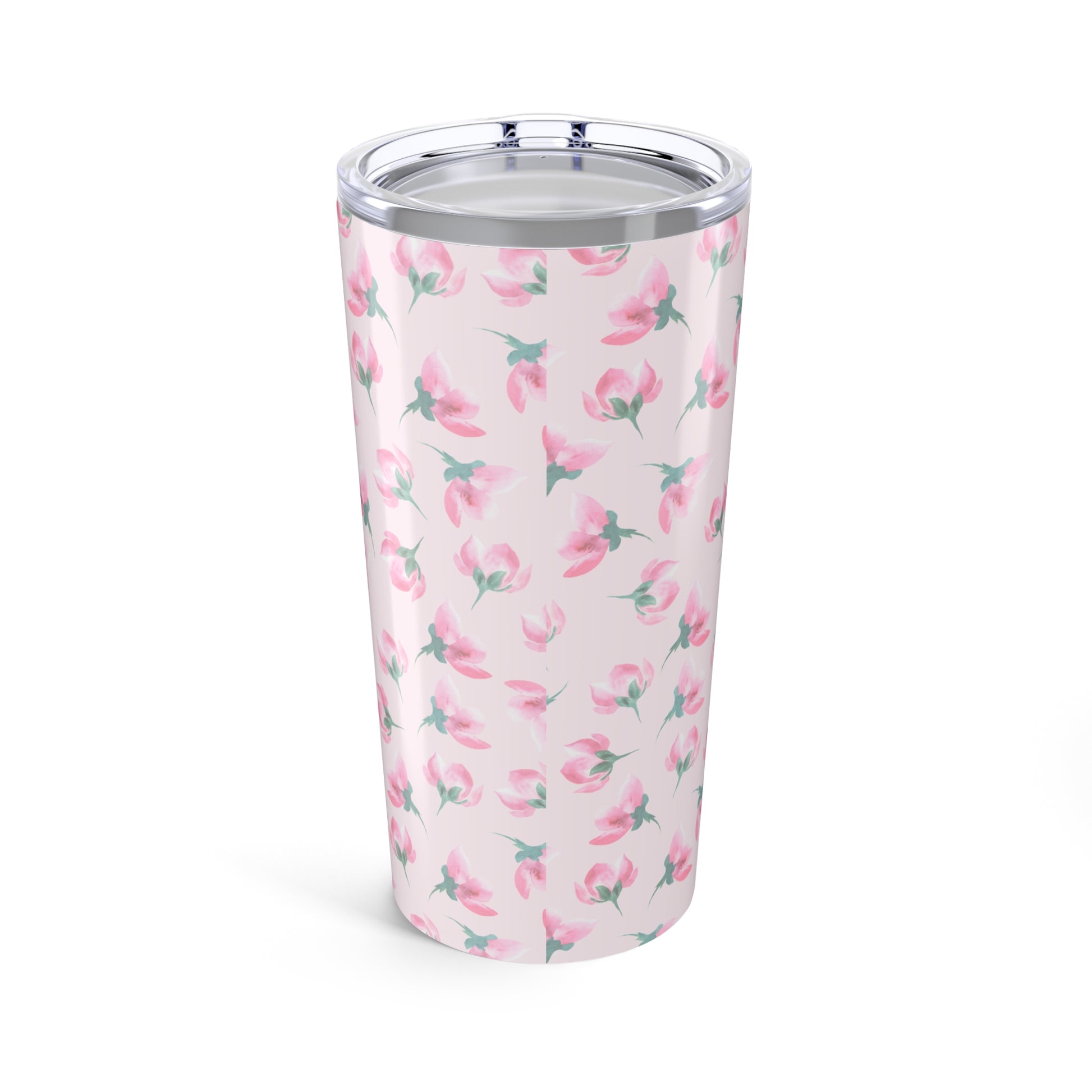 Tumbler with pink floral pattern on a light pink background