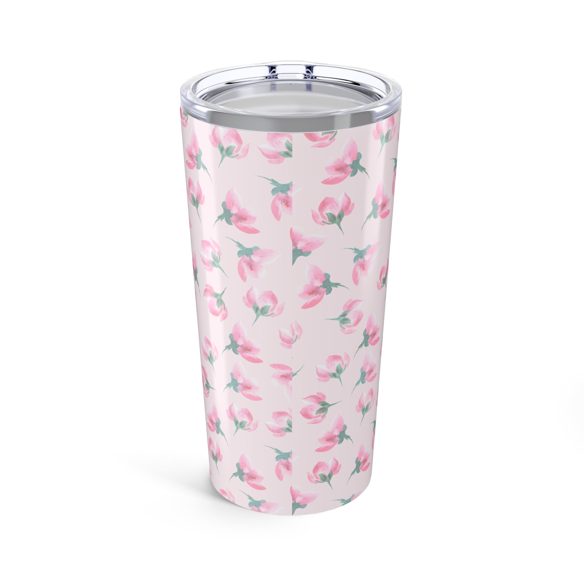 Tumbler with pink floral pattern on a light pink background