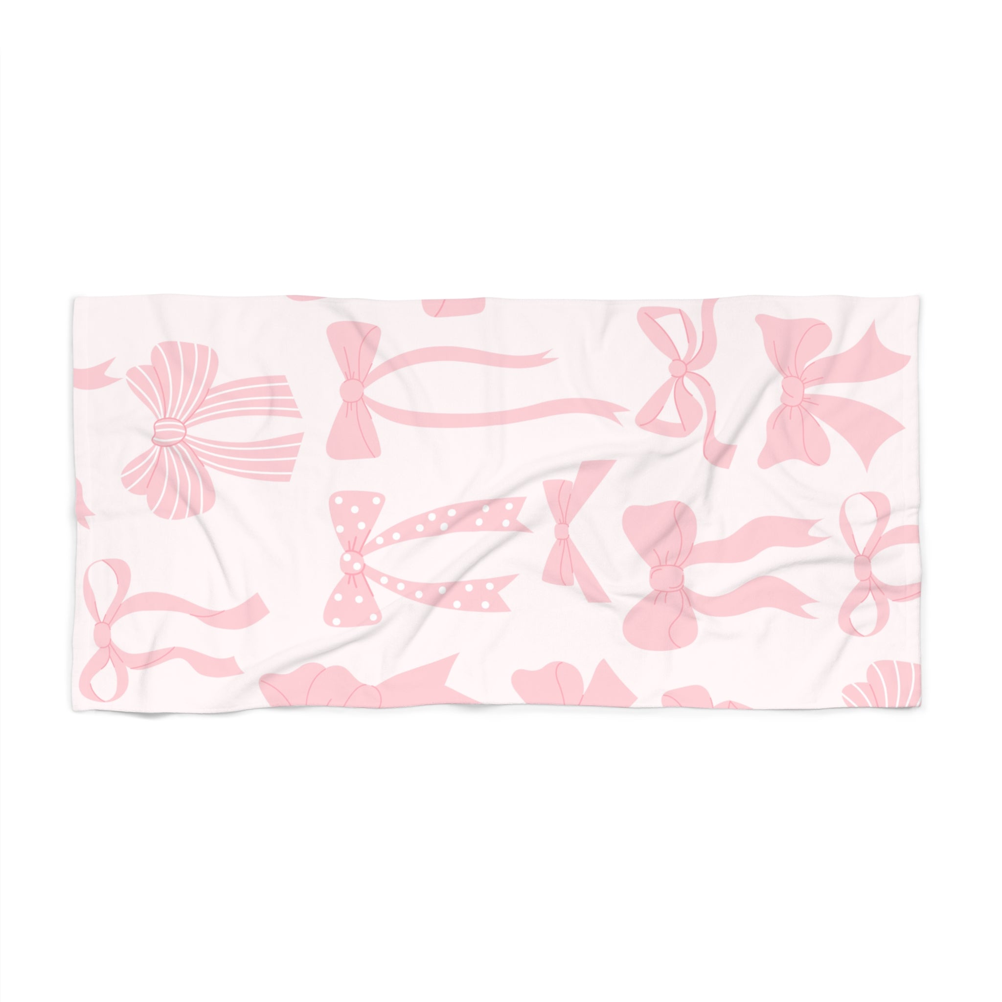 Towel with pink bow pattern on a white background