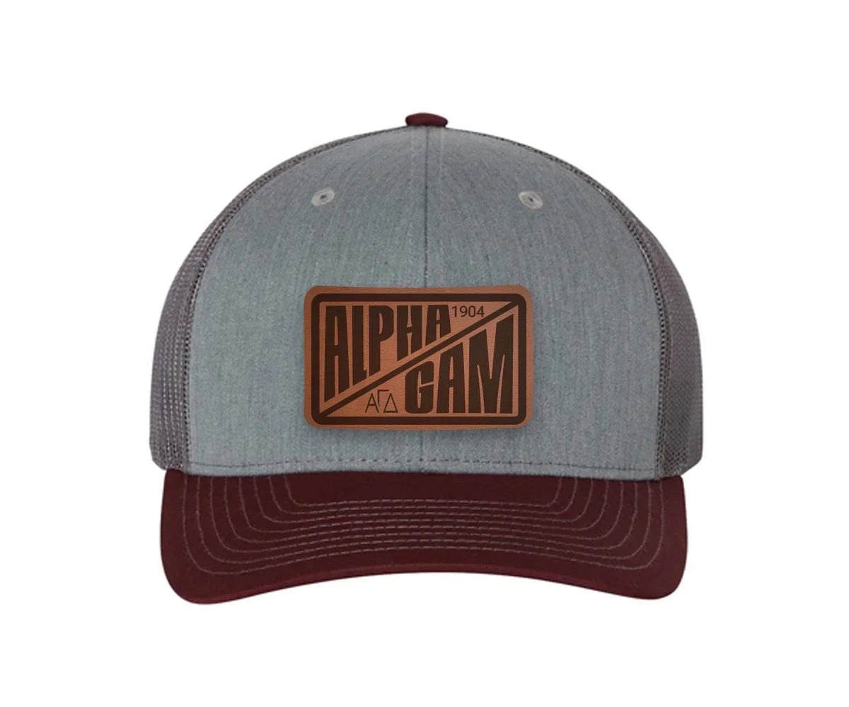 Alpha Gam Richardson 112 Leatherette Patch Trucker Hat - Divide