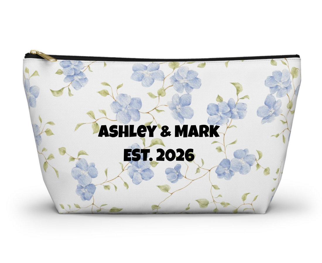 Floral-patterned pouch with blue flowers on a white background