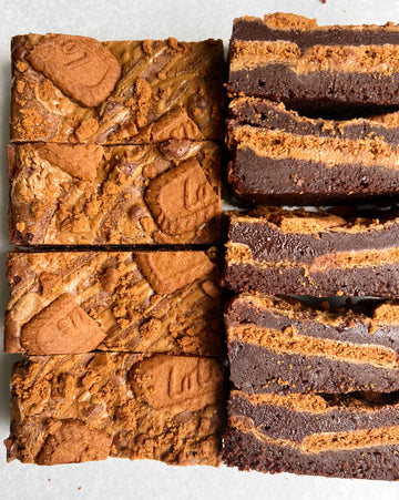Brownies with Biscoff cookie pieces on a white background