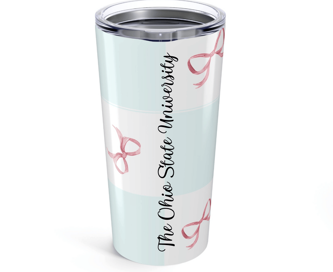 Tumbler with pink bow design on a white background