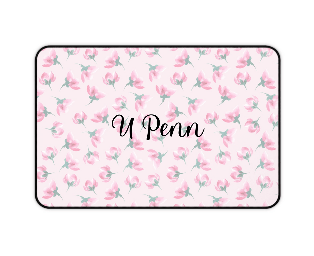Floral patterned mat with pink flowers on a white background