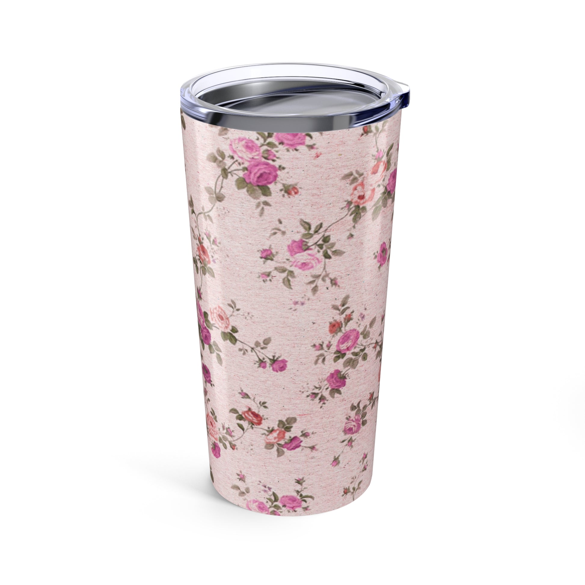 Floral-patterned tumbler on a pink background