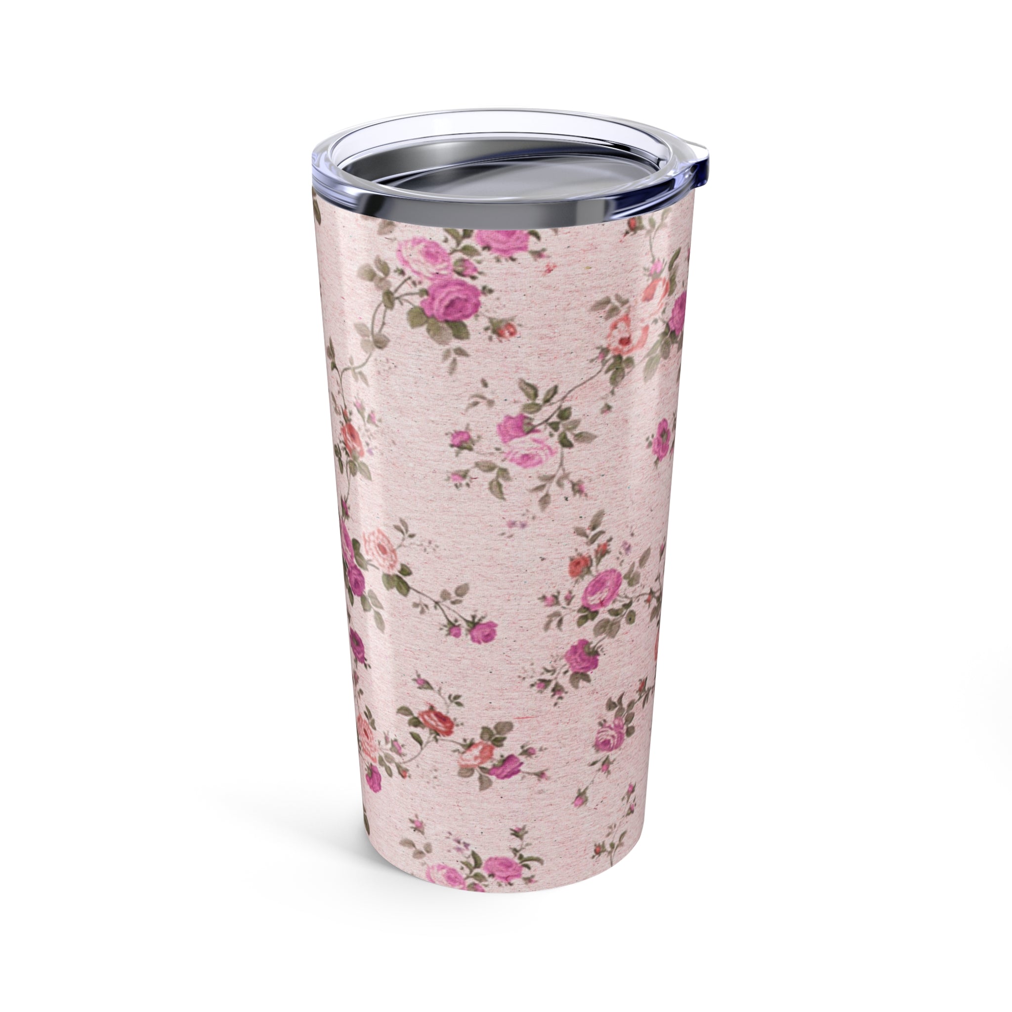 Floral-patterned tumbler on a pink background