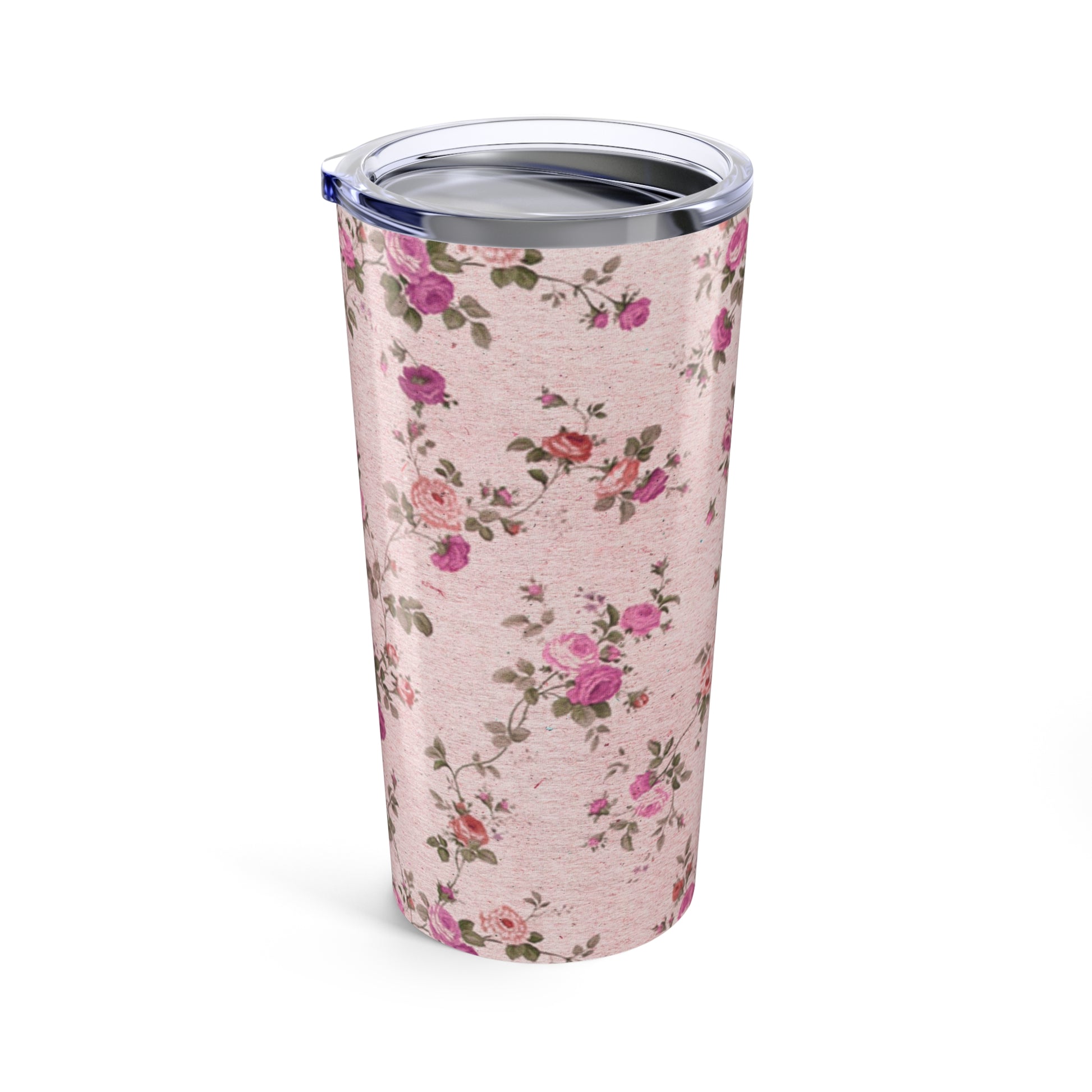 Floral-patterned tumbler on a pink background