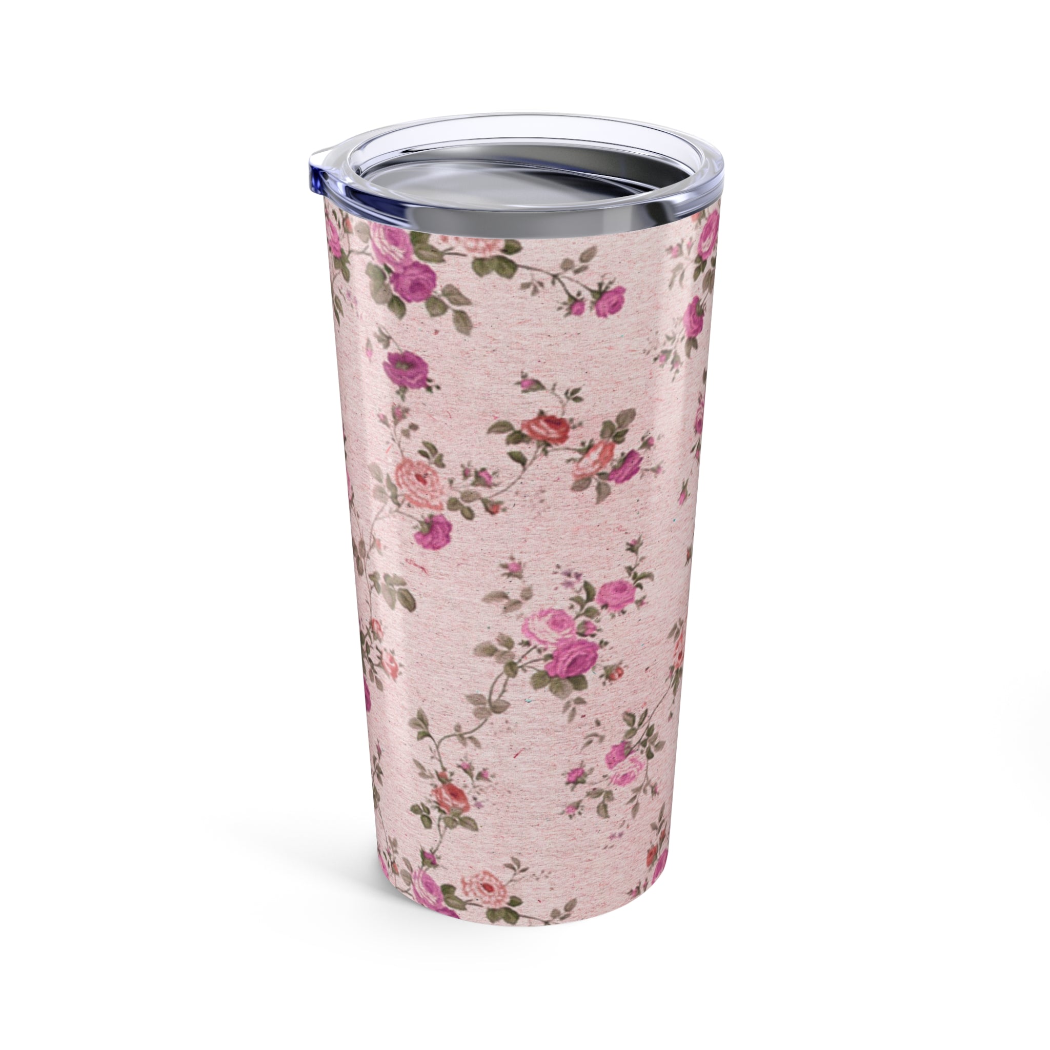 Floral-patterned tumbler on a pink background