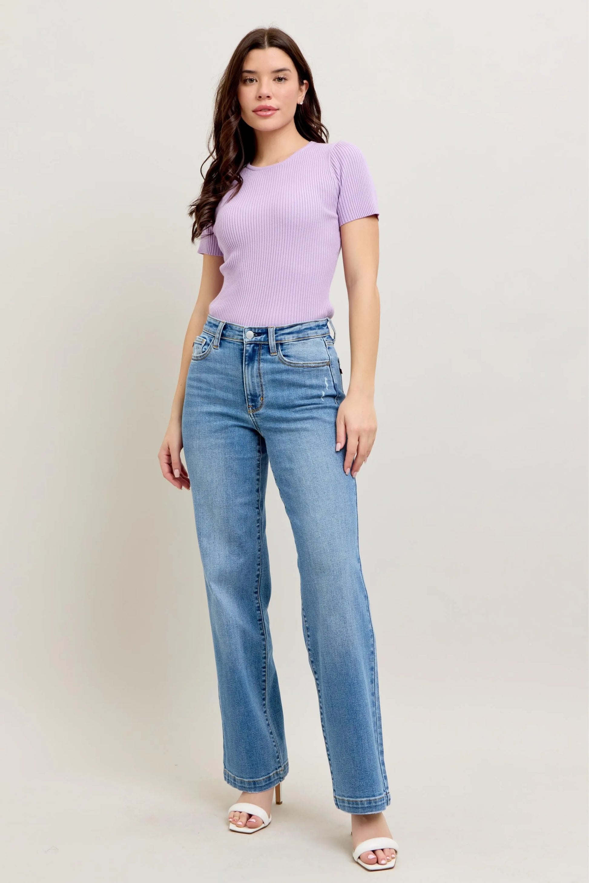 Model in Judy Blue Full Size High Waist Straight Jeans