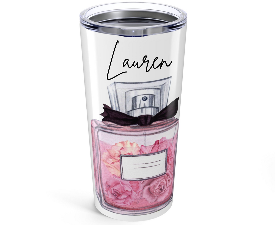 Clear tumbler with a pink perfume bottle design on a white background