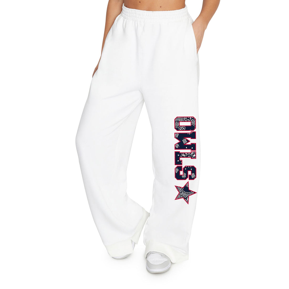 White sweatpants with black bandana patchwork with the word OWLS and a star going down the left pant leg