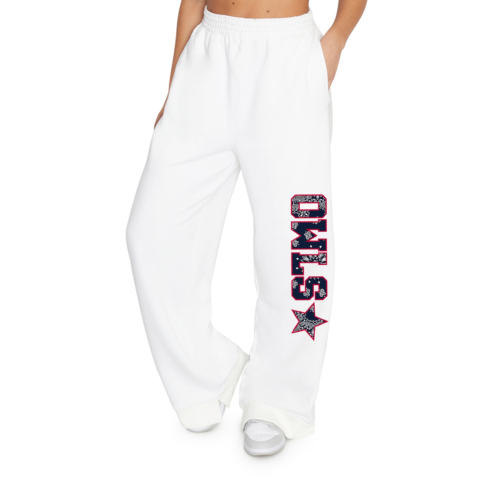 White sweatpants with black bandana patchwork with the word OWLS and a star going down the left pant leg