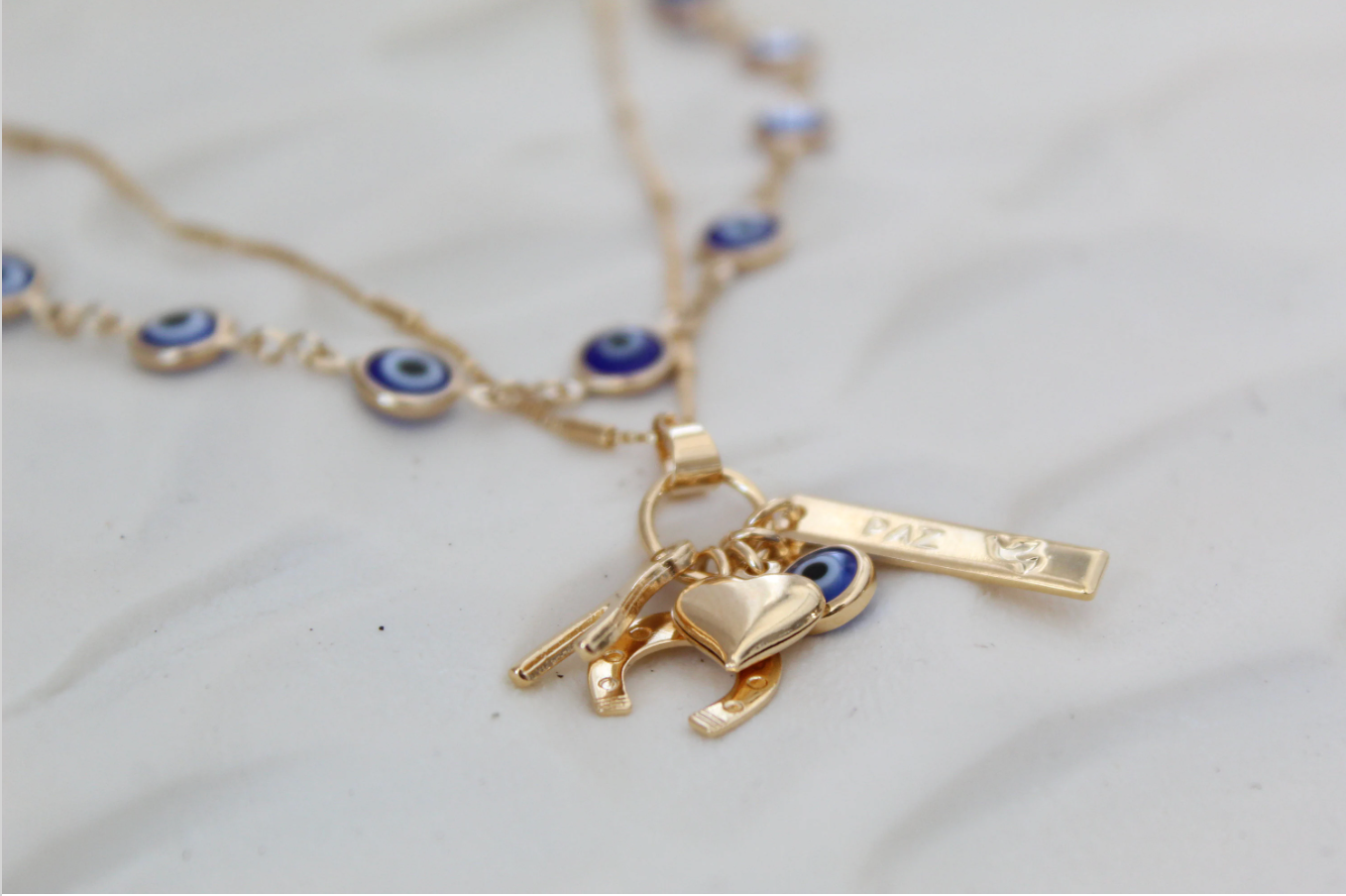 Views & Co. Protection Sapphire Necklaces