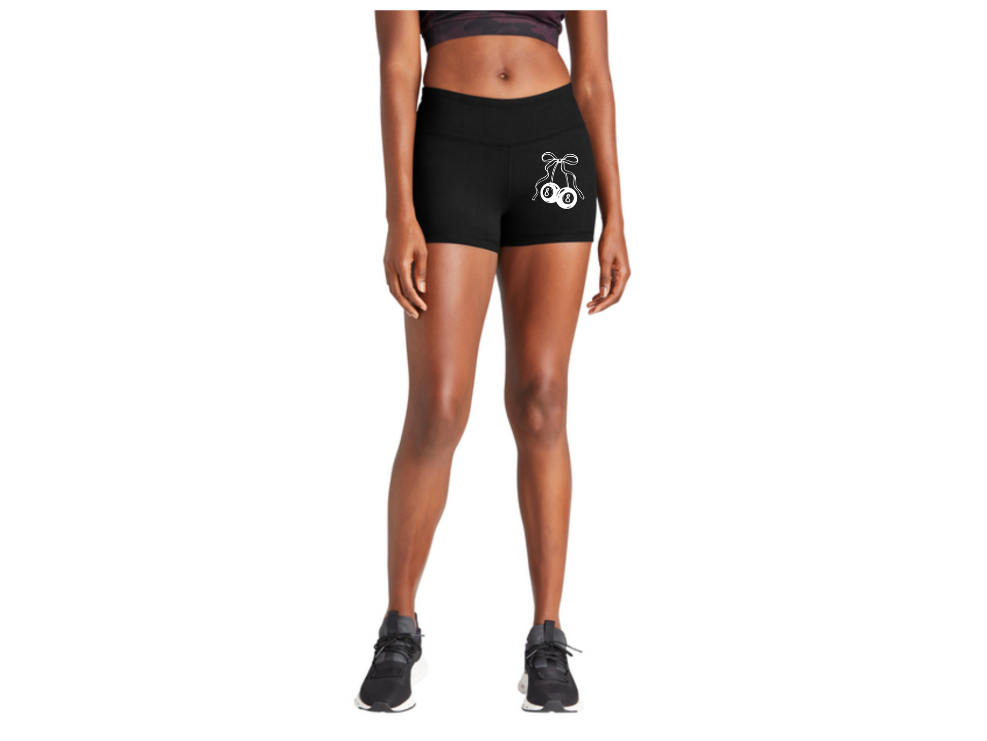 Person wearing black athletic shorts with a white logo on a white background
