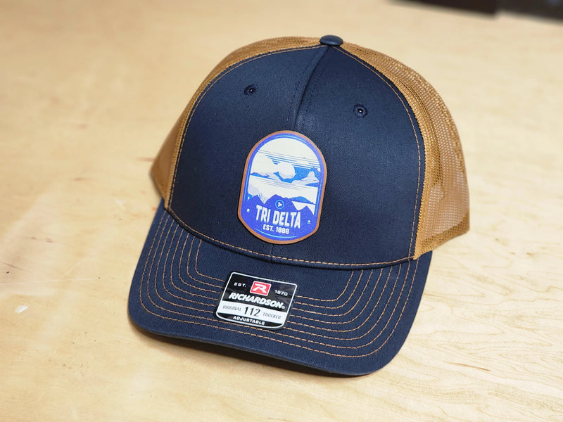 Tri Delta Richardson 112 UV Print Leatherette Patch Trucker Hat - Ventura