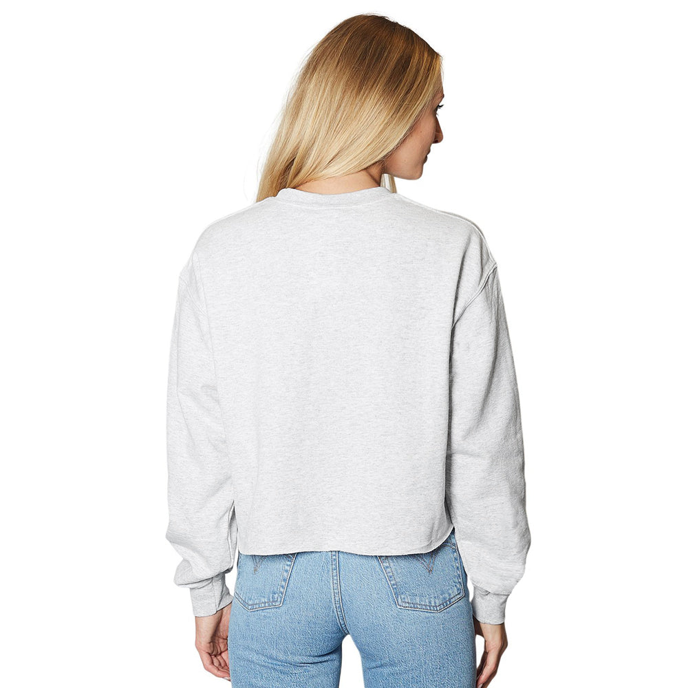 Woman wearing a gray sweatshirt with 'Virginia Tech' text on sleeves against a white background