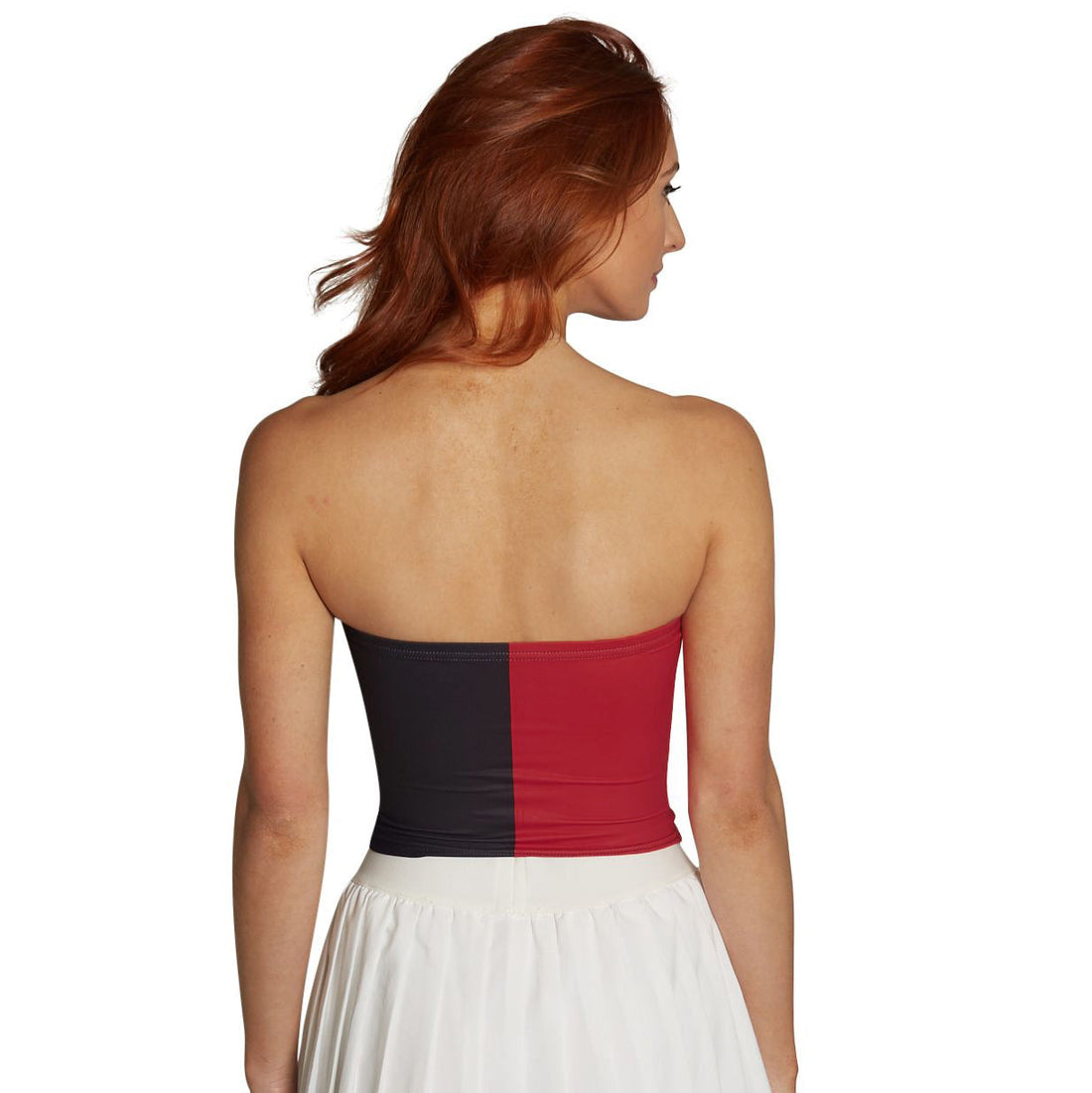 Woman wearing a strapless top with 'TEMPLE' printed on it against a white background