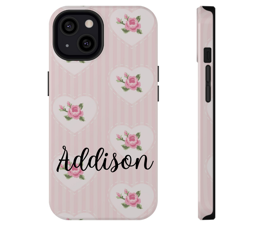 Phone case with heart and floral design on a pink background