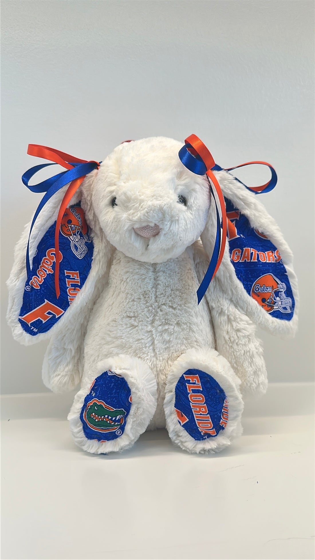 Plush bunny with Florida Gators logos on a white background