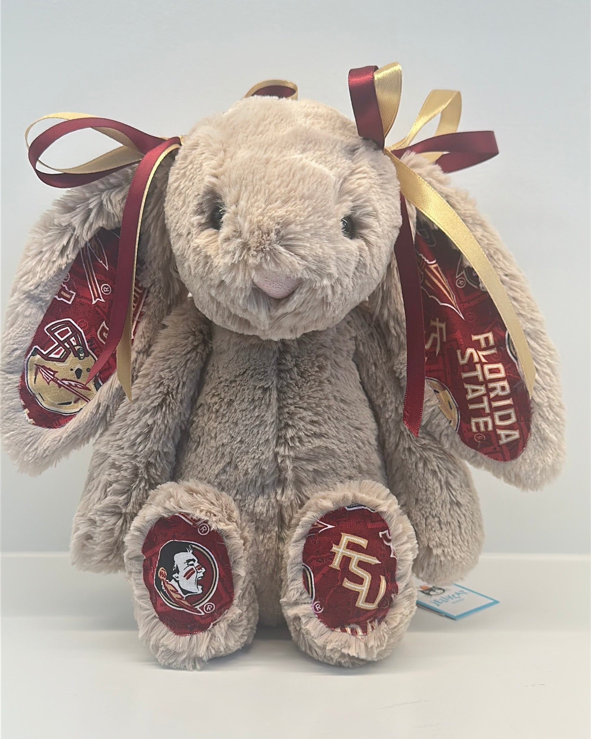 Plush bunny with Florida State University logos on a white background