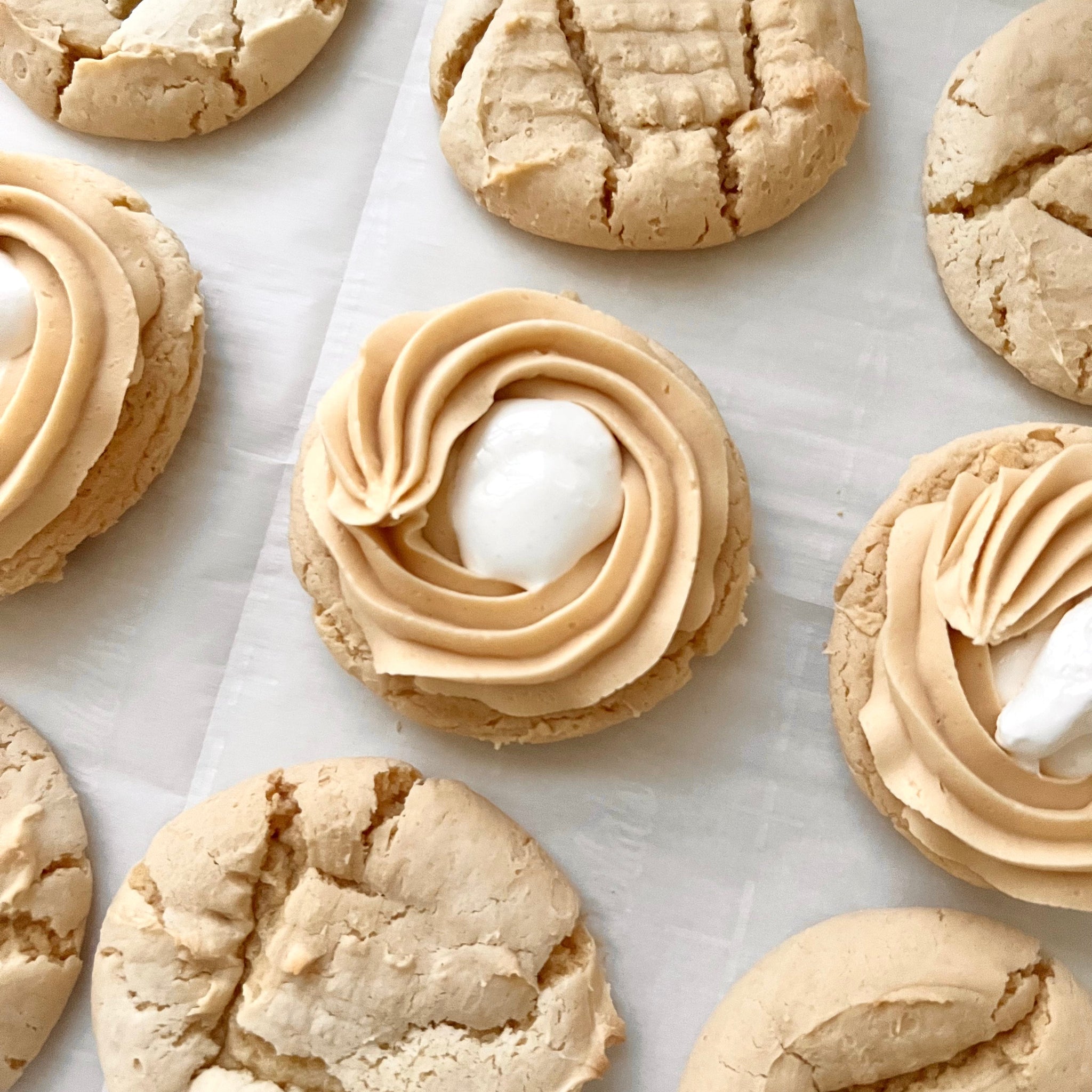 Cookies with a cream filling on a marble surface