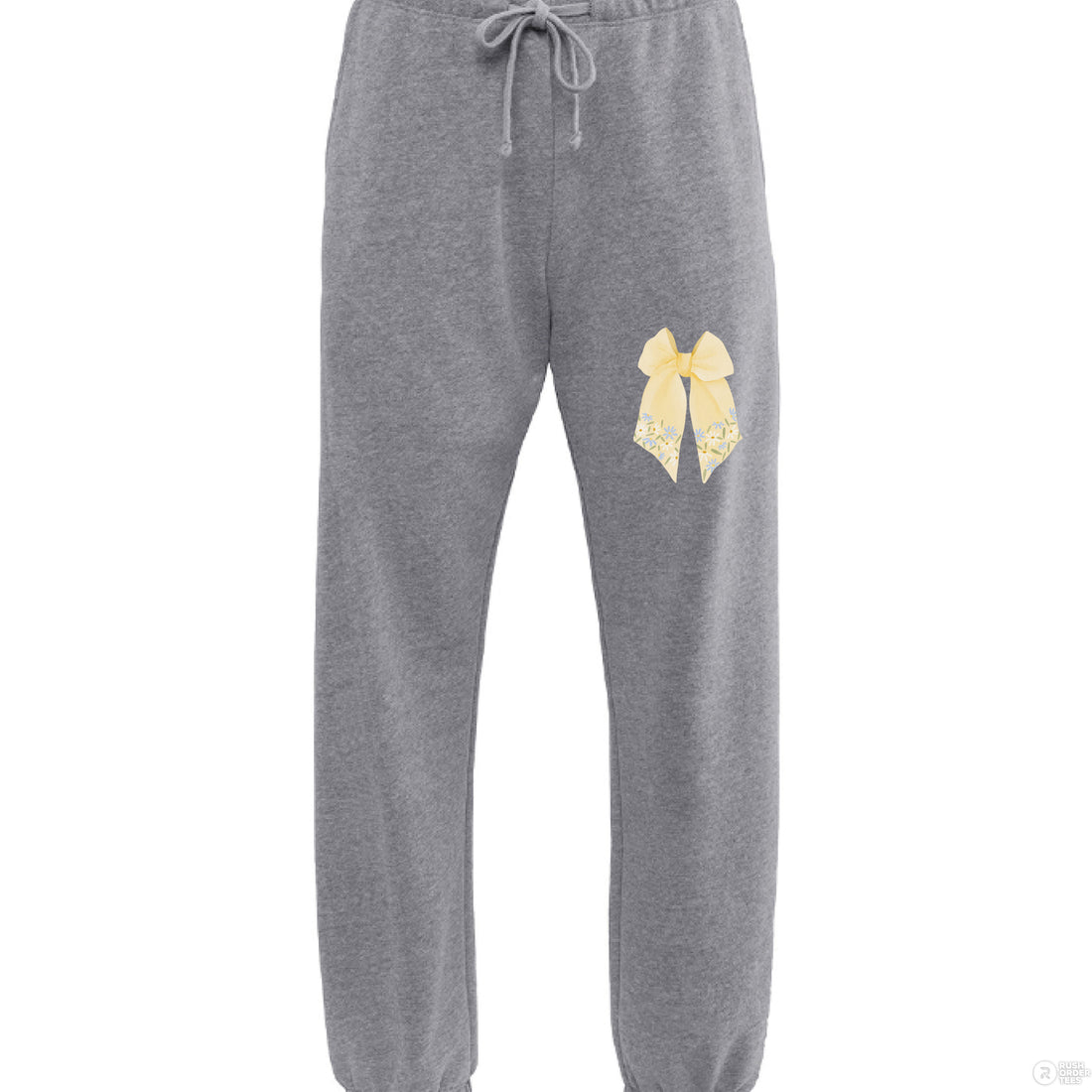 Woman wearing a black 'Ole Miss' themed pajama set with gold bows on a white background