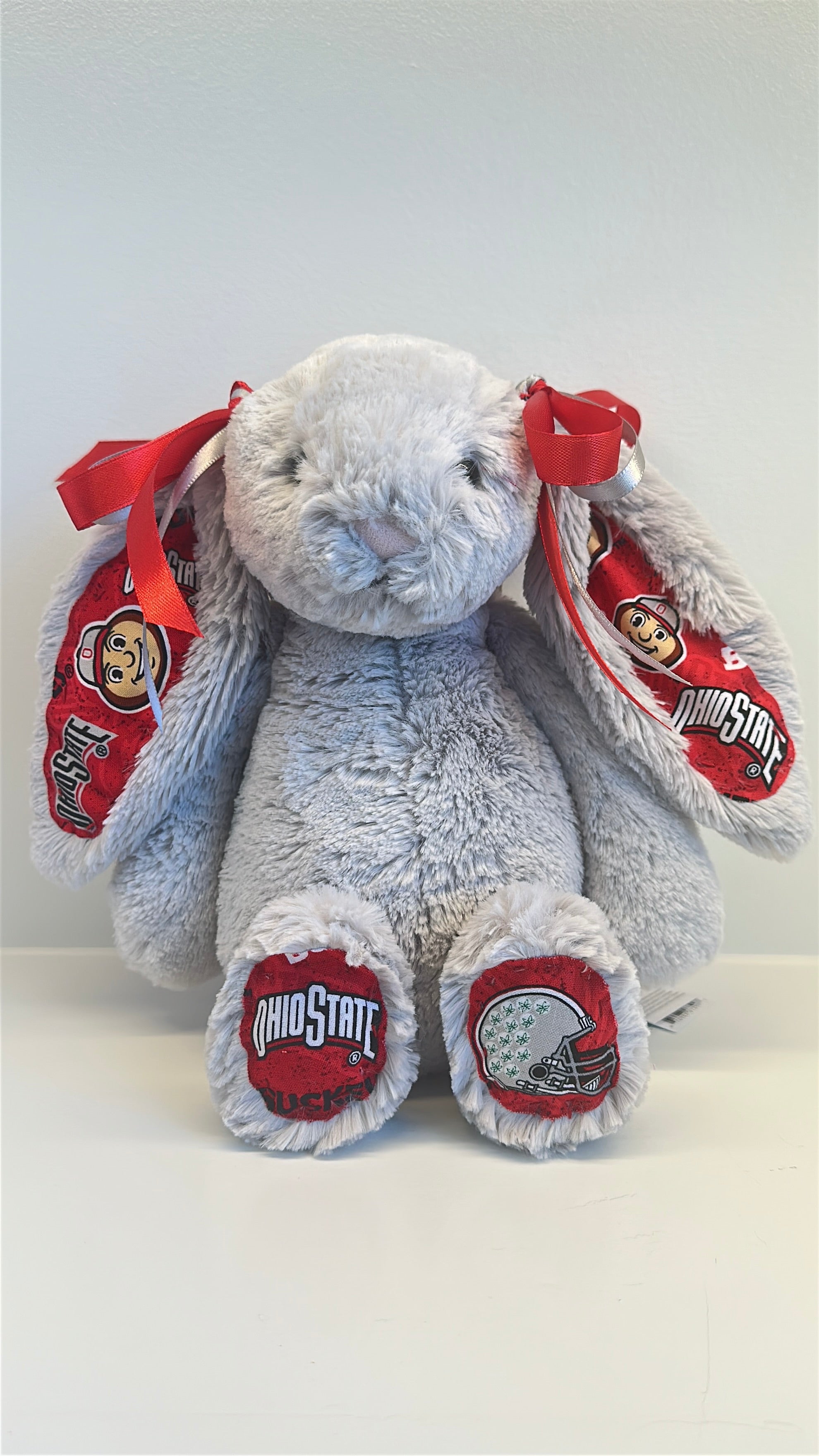 Gray plush bunny with Ohio State logo on a white background