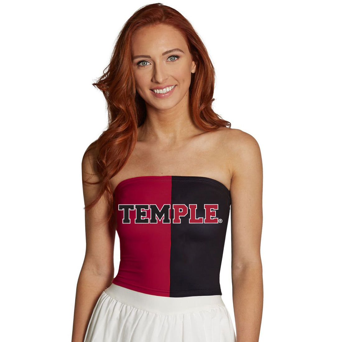 Woman wearing a strapless top with 'TEMPLE' printed on it against a white background