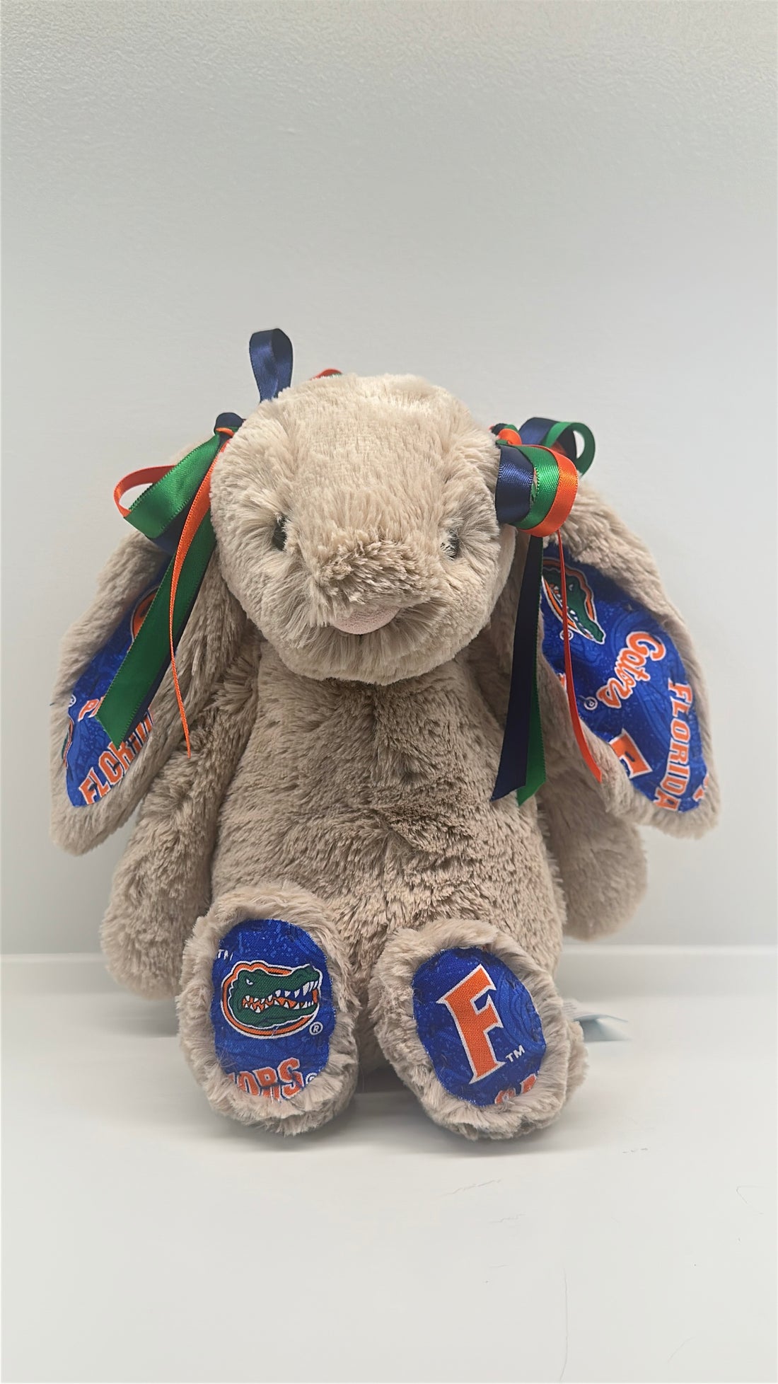 Plush bunny with Florida Gators logos on a white background