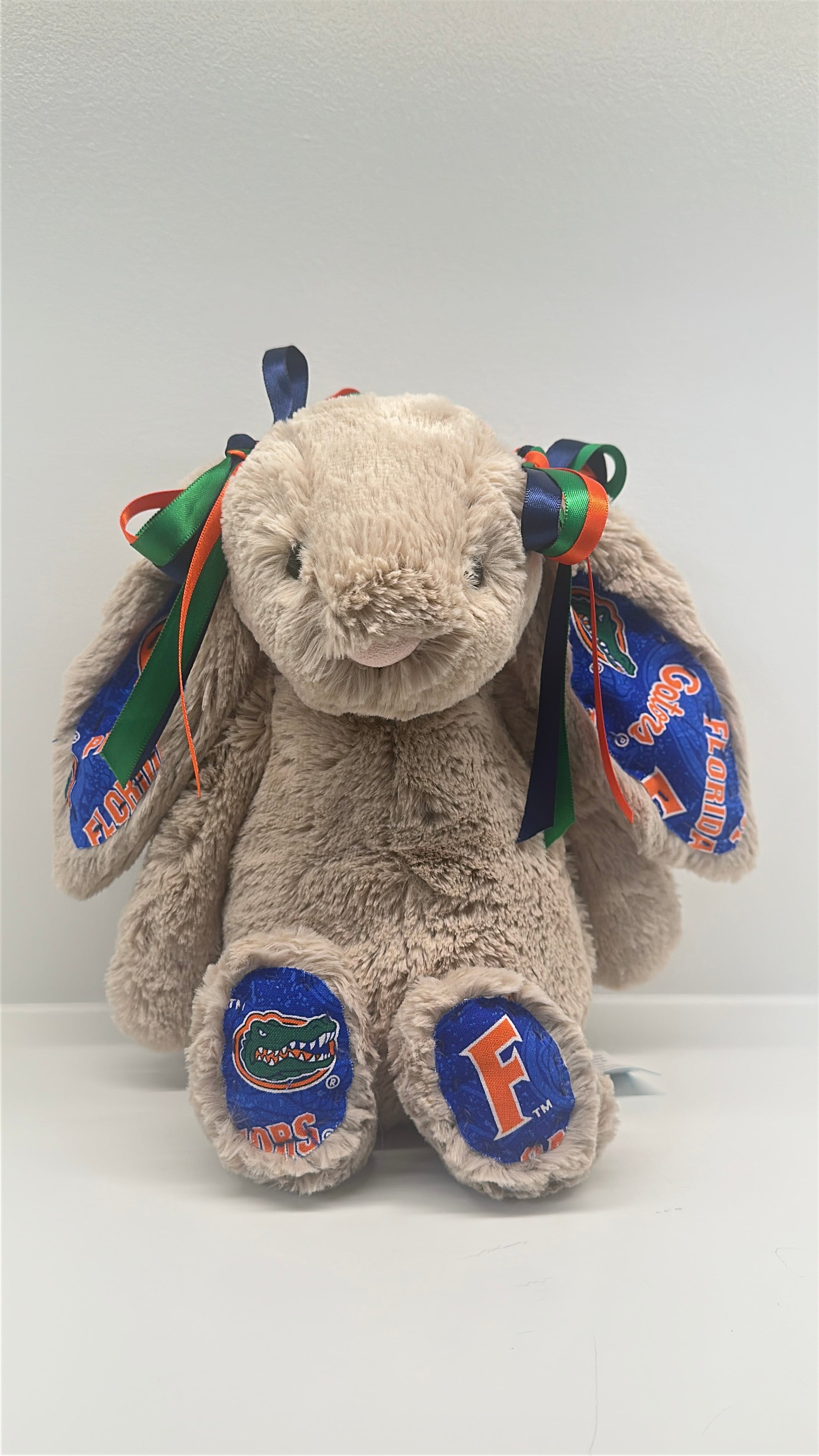 Plush bunny with Florida Gators logos on a white background